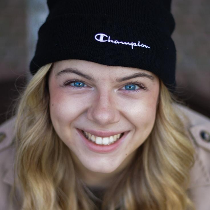 Kaveri Mehta, Lead Design Curator at StarlightOceanAlliance, reviewing corporate floral arrangements